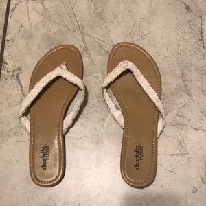 Tan flip flops with white lace
